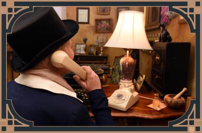 Woman on telephone in escape room